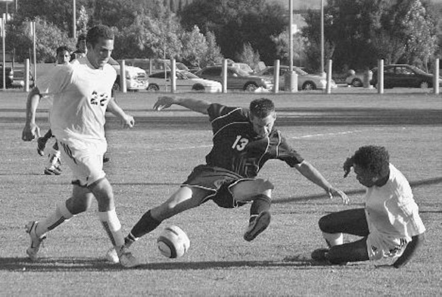 MoorparkÂ´s Patrick Smith, middle, fights for the ball in the tie against Citrus. Smith is ranked 24th in the state in goals and 17th in assists.