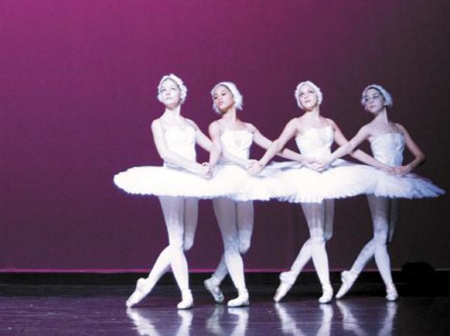 Ballet Arts dancers Mimi Borbas (age 12), Maria Kovaleva (age 14), Mercedes (age 13), and Paige Weller (age 14) perform their original act "Four Swans" on Friday at the "Artists for Katrina" event.