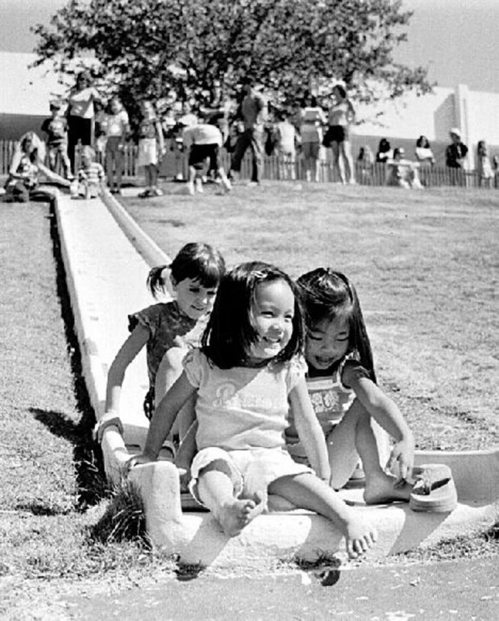 Kylie Medina, 2, front, Tristen Medina, 2, and Allison Wilson, 5, slide at Discovery Day, held at Moorpark College on October 15.