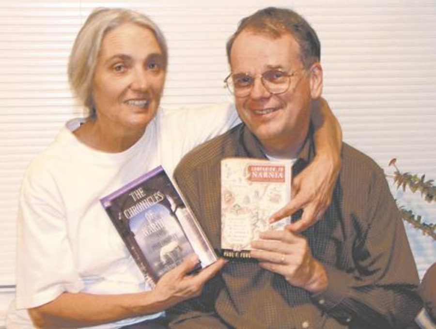 Professor Janice Daurio and her husband Paul Ford show off their published works related to C.S. LewisÂ´s "The Chronicles of Narnia"