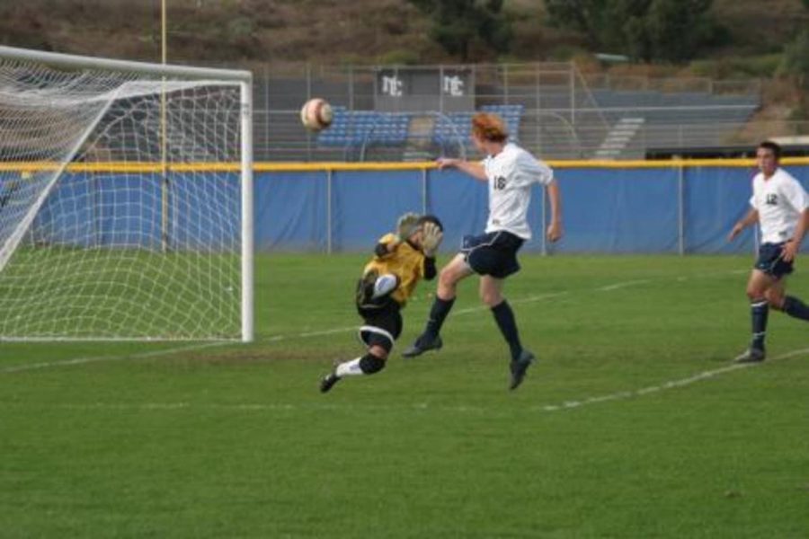 Oxnard goalie Kenny Negron stops MoorparkÂ´s Robert HectorÂ´s shot. Negron was a main factor in the 1-0 shut out win vs. county rival Moorpark.