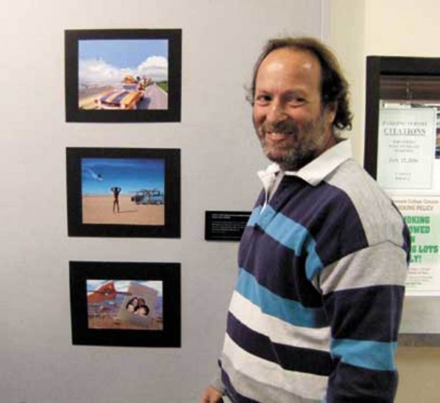 Moorpark college student Tevor Gotsman views some of the photos displayed at the multi-media event.