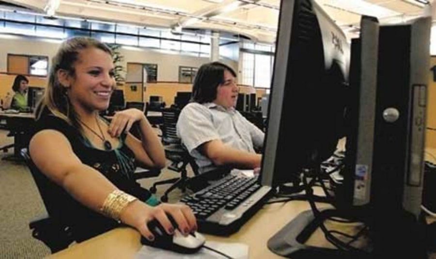 Jordan Krem, 18, and Luke Dexter, 19, both undecided majors, are both at work at the beach, located in the VC library.  The Internet Cafe will relieve some of the tension and traffic the beach is currently under due to highly popular websites such as MySpace and other gaming sites.