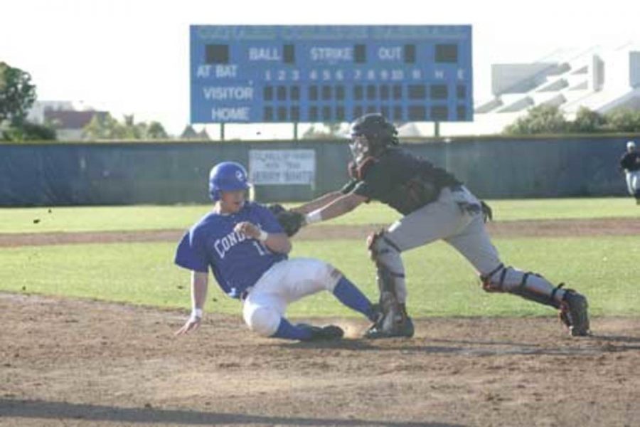 OxnardÂ´s Spencer Kirksey is tagged out by Aaron Austin as he tries to make it to the base. The defending champion Condors fell 2-1 to the Pirates in a game that featured great pitching but little offense.