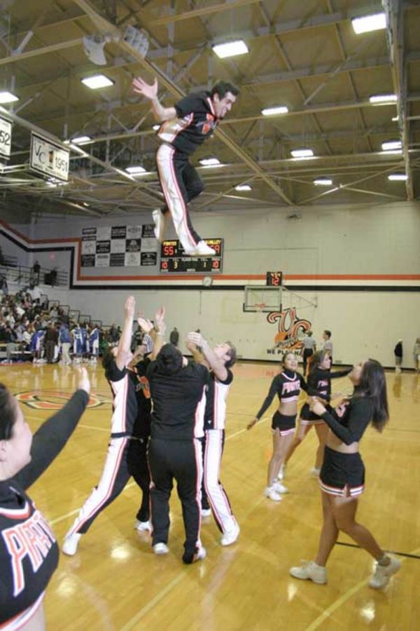 Ventura CollegeÂ´s cheerleading squad peforms a routine. The team has won numerous championships and a national title.