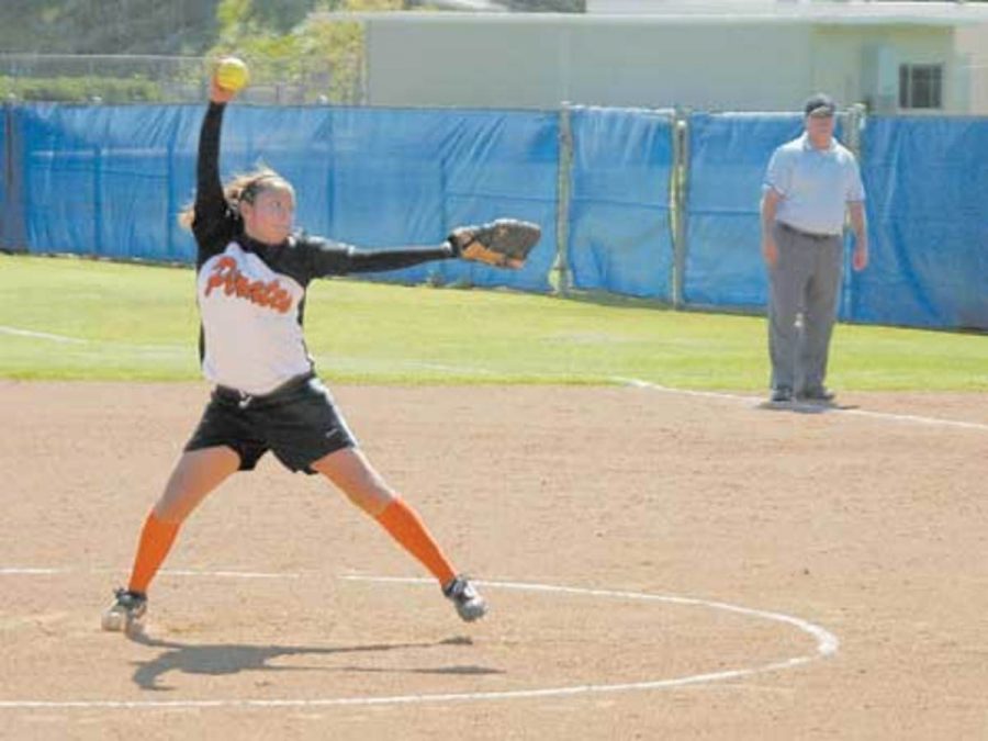 Winning pitcher Amanda Basquez winds up to deliver a pitch for Ventura. College. The Pirates beat the Raiders 3-1 in the third and final meeting between the two teams this season.