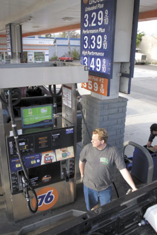 Moorpark College student Todd Rogers, 29, fills up his diesel truck at a local 76 station. Gas prices have hit record highs in the last few months, and continue to rise throughout Ventura County.