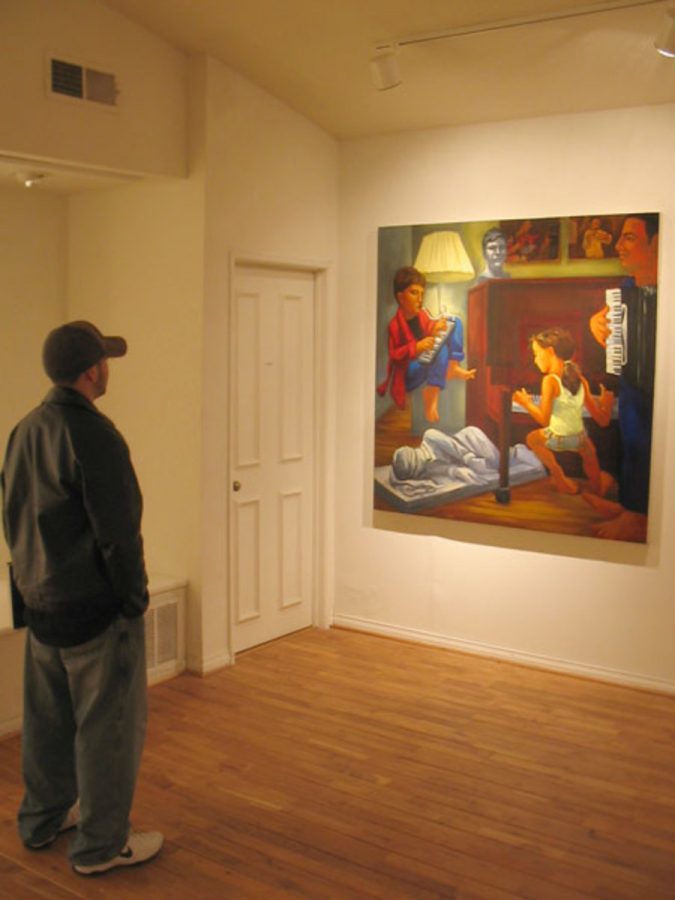Jose Ramirez of Oxnard College contemplates the meaning of Hagop Nararians painting entitled Timelessnest.