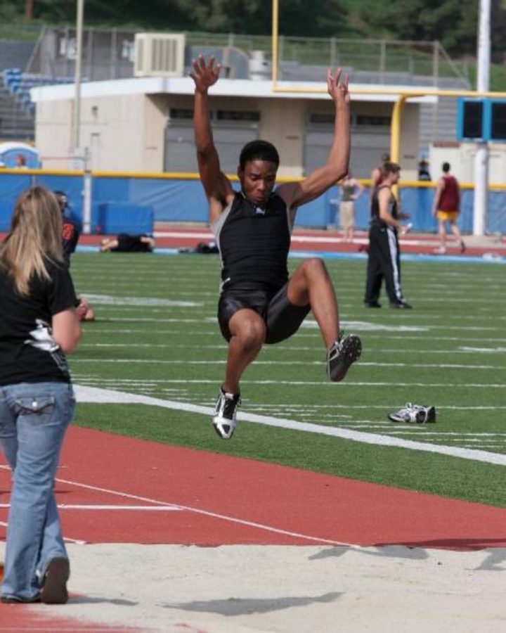 Lance Bush competes in the long jump in a meet against Ventura, Santa Monica and Glendale on March 7.  The Raider men finished in first place overall.