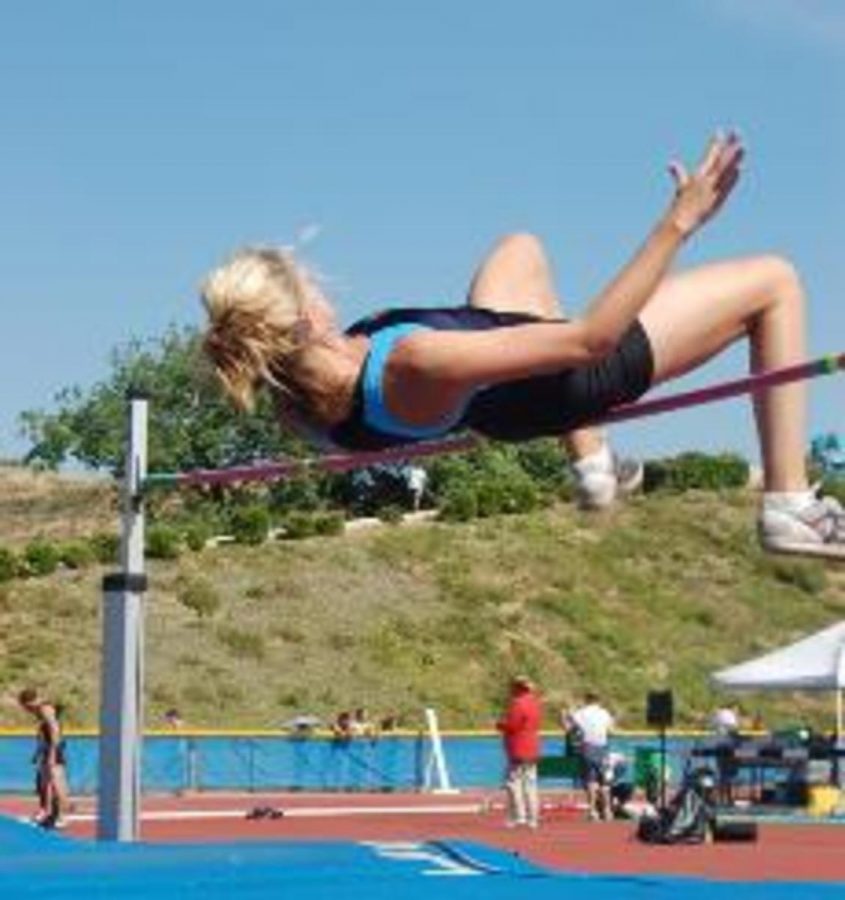 Elizabeth Wigton attempts to clear the bar in the womens high jump.