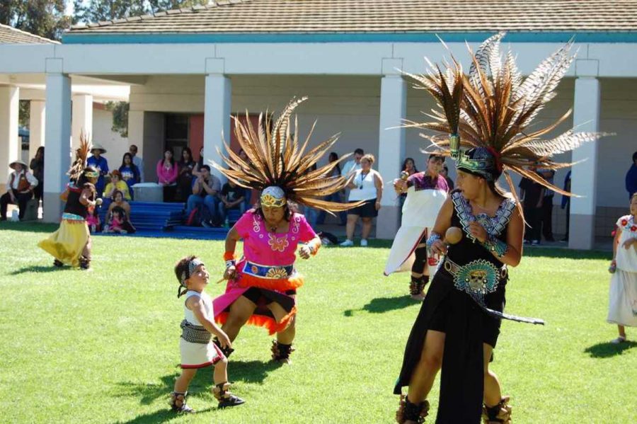Members of the Danza Mexica Cuauhtémoc Azteca Dance Group perform on the Asian Pacific Student Union stage near the bookstore as part of Oxnard Colleges annual Multicultural Arts Day celebration on Oct. 8.