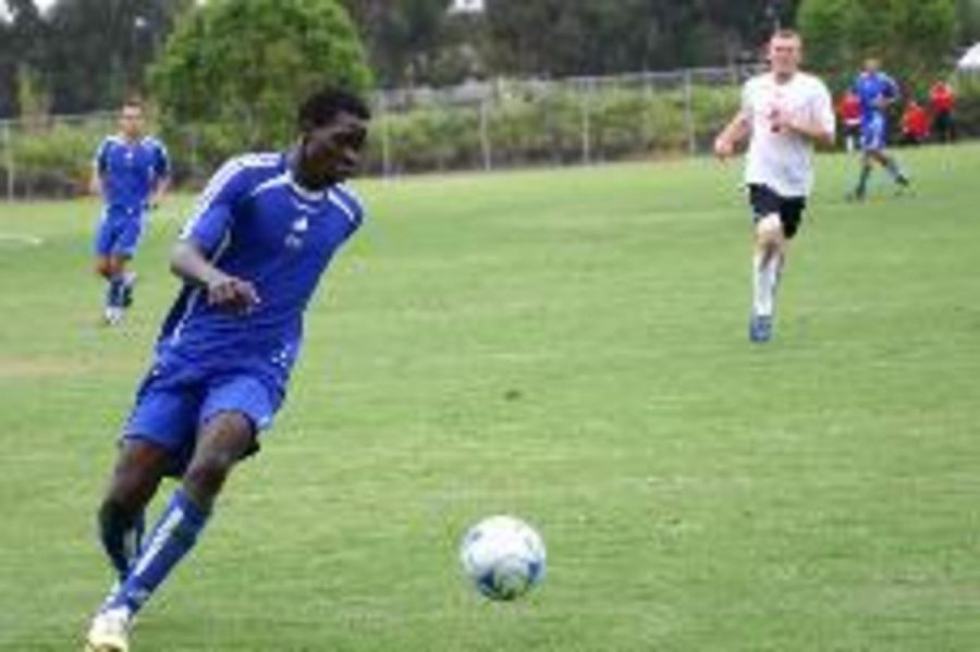 Condors No. 14 Mathayo Humo works to keep possession of the ball 