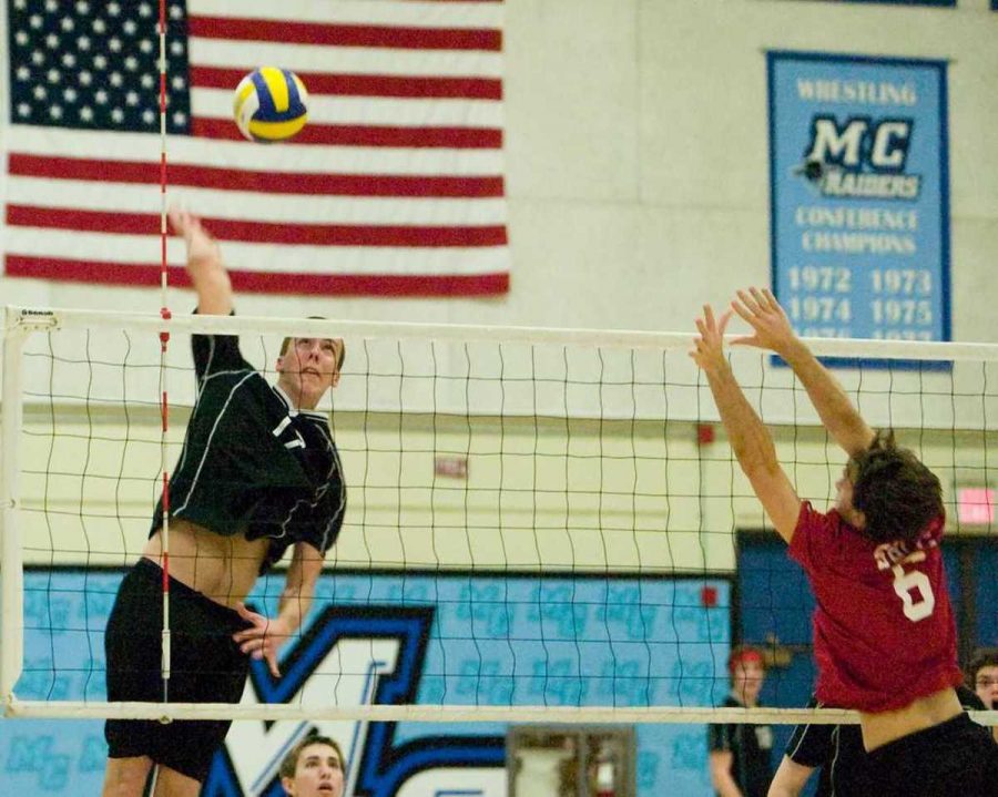Moorparks No. 17 Middle Blocker Kyle Auge goes up to make a kill against Santa Barbaras No. 6 Tyson Rietz attempts to make the block.