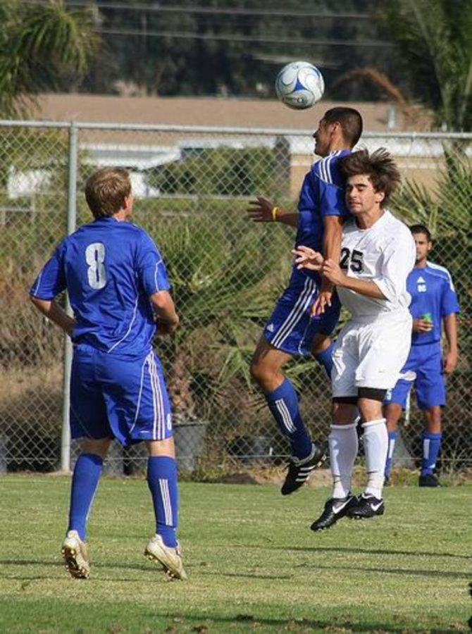 Oxnard's Jonathan Martinez goes up for a header in the home game against Moorpark on Oct. 9, 2009.