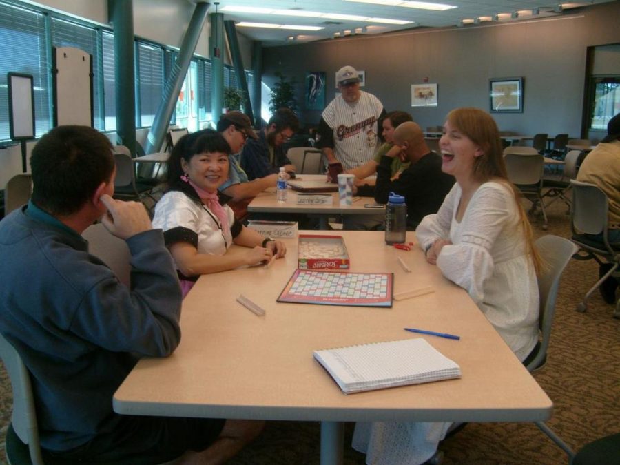 Scrabble Day participants exercise their mental muscles. Dozens of enthusiasts came together to share their passion for Scrabble.