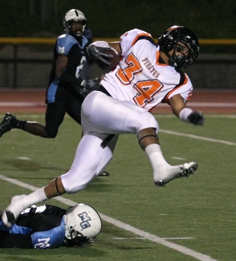 Ventura College running back No. 34 Dominic Morris heads up field.  Ventura clinched its second straight Citrus Cup trophie in a row as they defeated Moorpark 41-28.  