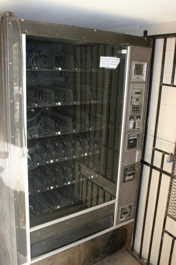 An old vending machine is empty and ready to be replaced in March.
