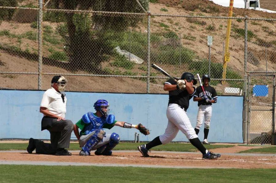 Moorpark's Jason Wittington bats in a game against Oxnard March 20. The Raiders have only won two conference games this season.