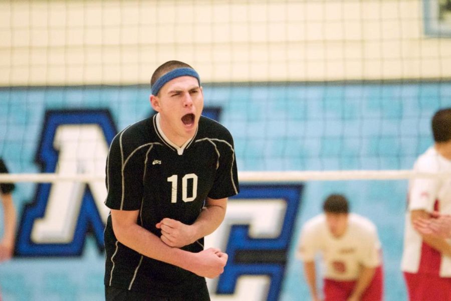 Raiders setter Adam Quinn gets pumped after a side out in a match last season. The sophomore leader hopes to guide his team to a state championship berth.