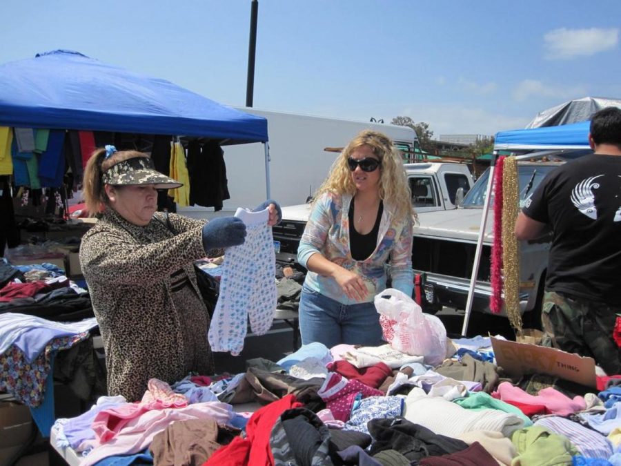 Gigi Fiumerodo, co-advisor of the VC Anthropology Club, helps out a customer at the clubs rummage sale on April 10. 