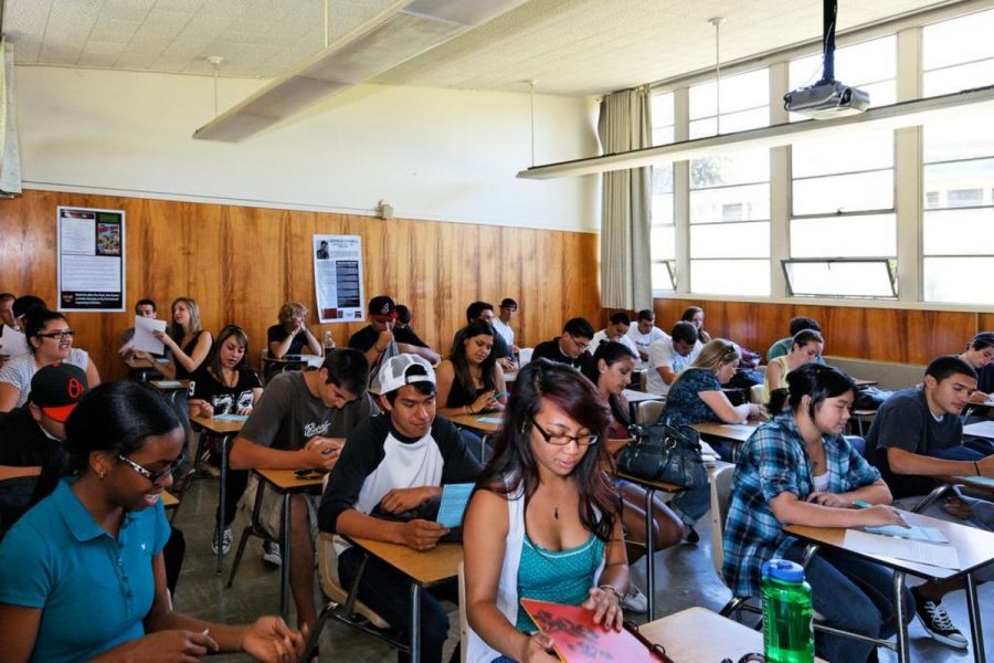 Students sit in a full English B01A class at Ventura College during the first week of class. Currently their are 4 Students are on this waitlist, with 27 already enrolled.