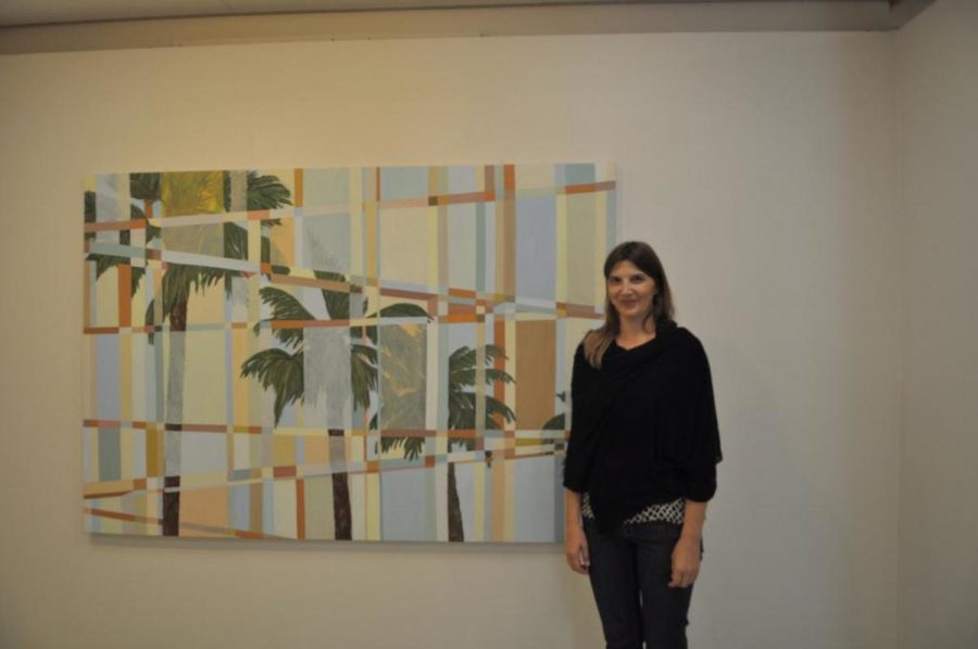 The artist, Miriam Noske, with her piece "California Landscape."