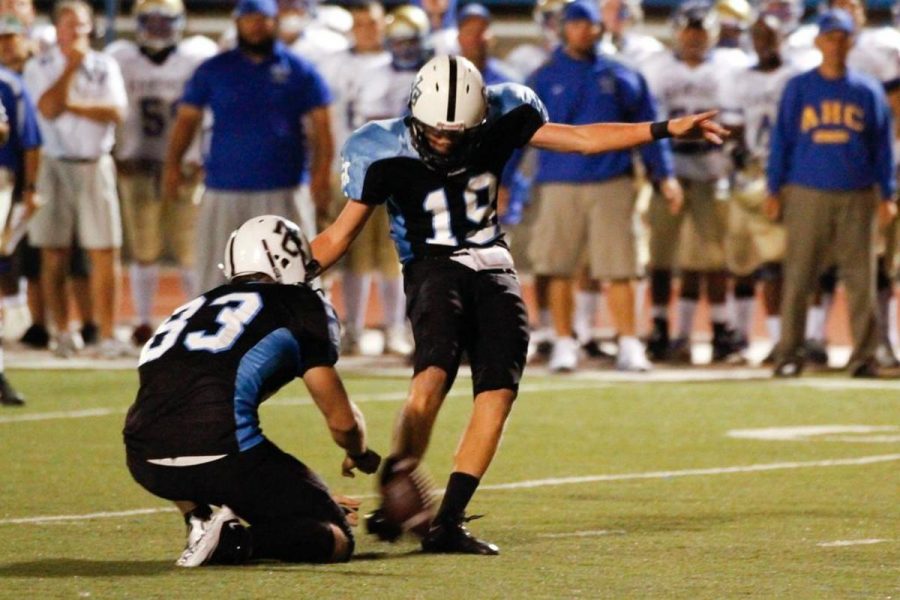 Zach Shultis kicks a field goal, as Jerry Henry holds, with 3 seconds left in the game at Griffin Stadium on September 18, 2010. Moorpark won the game 22-21, ending a 13 game losing streak. 