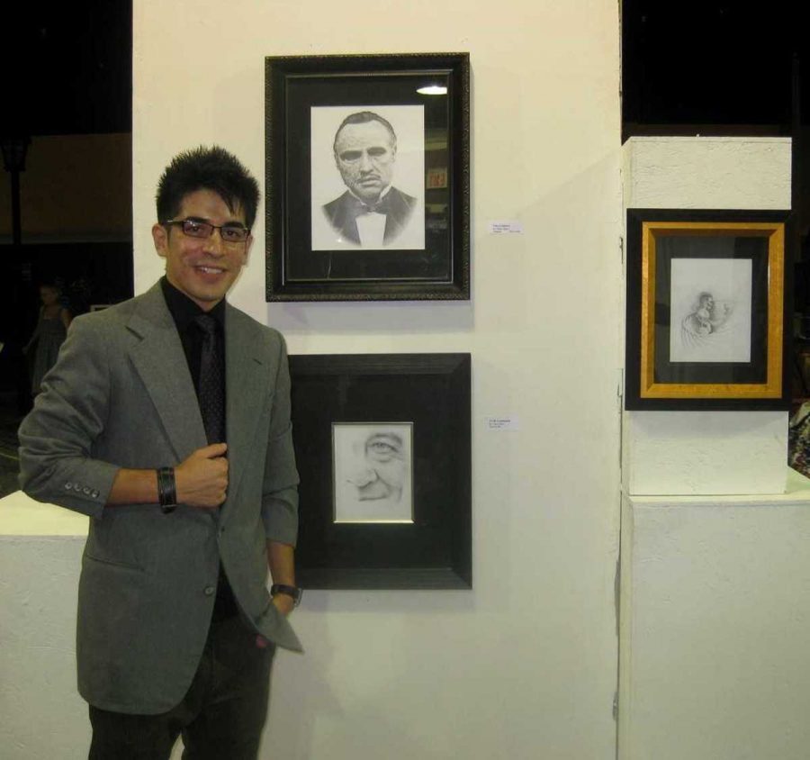 Urian+Muro+poses+with+his+graphite+art+at+the+Gallery+Expo+in+Long+Beach