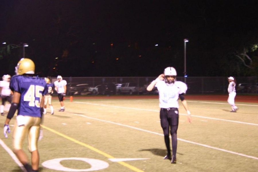 Zach Shultis walks off the field in dissapointment after throwing his fourth and final interception of the night. Moorpar lost to L.A. Harbor 46-14