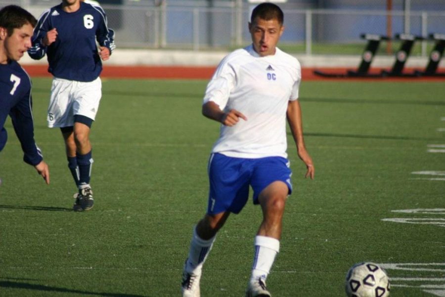 David Torres,freshman,mid-fielder tries to create some last minute offense for Oxnard as he drives towards L.A. Harbor's goal Nov. 20