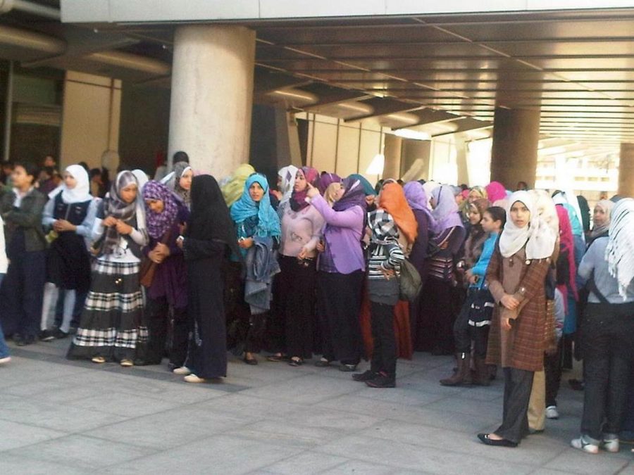Egyptian women await to hear the remedies for Egypt in Cairo. 