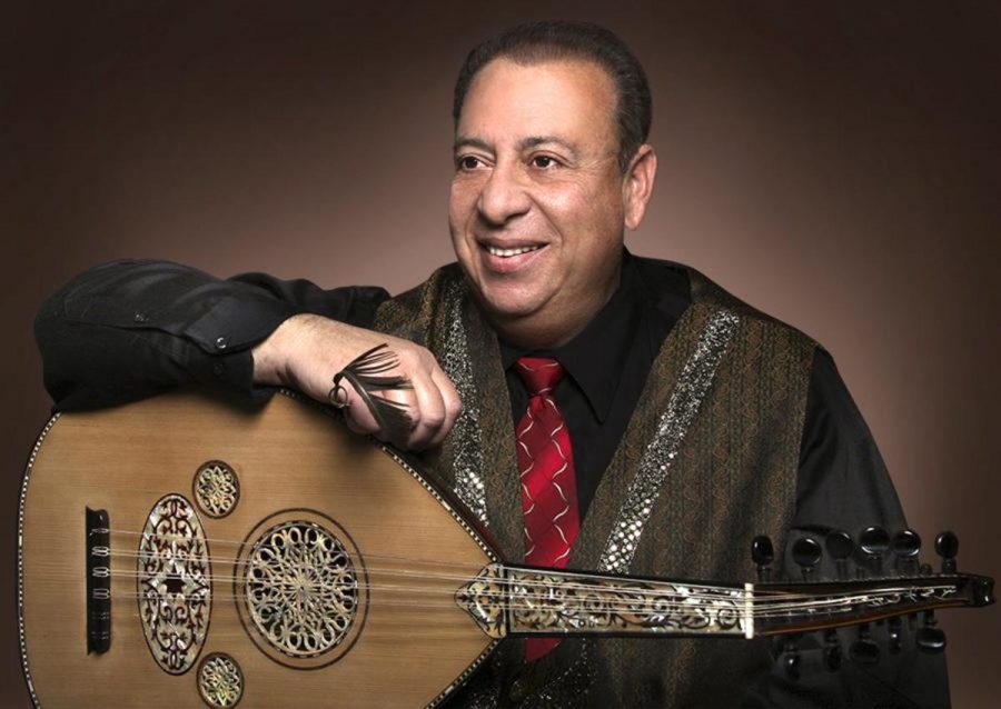 Portrait of Bilezikjian with his traditional 11-string Oud, played using an eagle feather