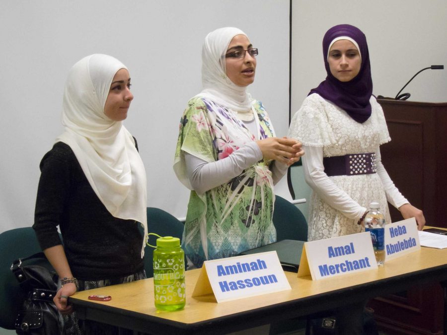 Aminah Hassoun (left), Amal Merchant (center), and Heba Abulebda (right) share their thoughts on how it is to be a Muslim student on campus, presented in the MC cafeteria on Sept. 13.