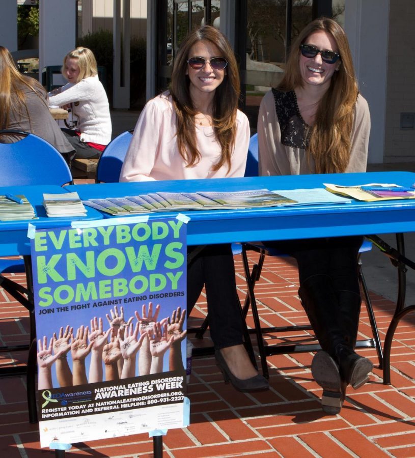 Rachel Matusko, l, and Sarah Garcia at the National Eating Disorder Awarness (NEDA) information table at Moorpark College on Thursday, March 1, 2012. National Eating Disorders Awarness runs until March 3, 2012.