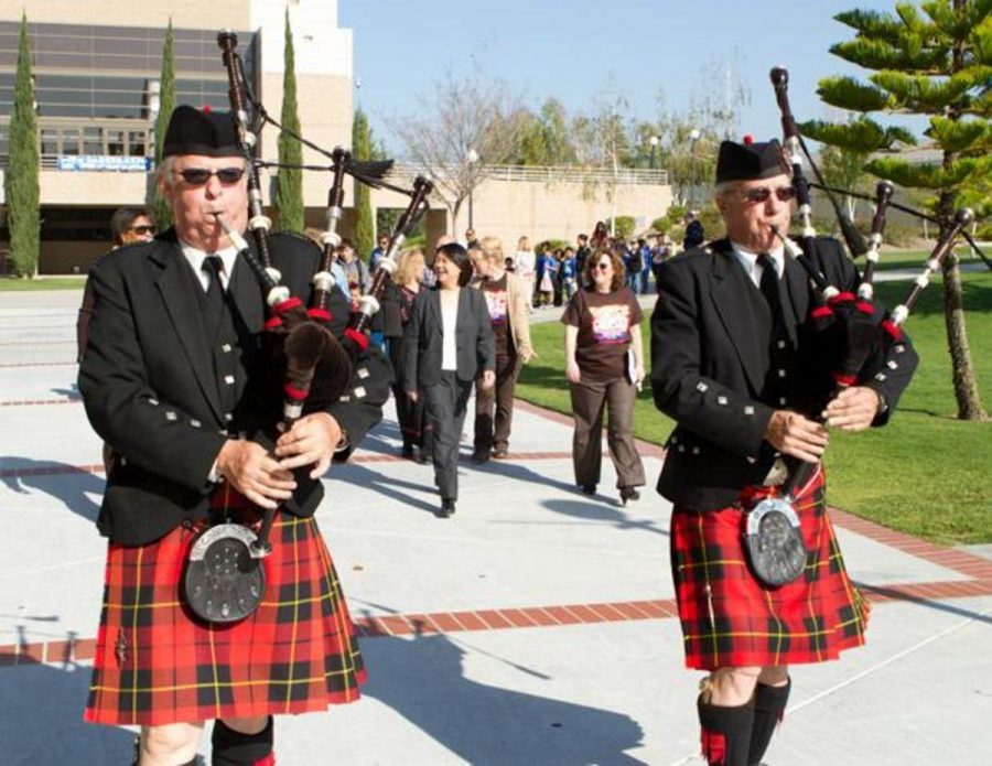 Bagpipers Bill Boetticher and Wally Boggess lead the opening parade ahead of Moorpark College President Dr. Pam Eddinger and Dean Dr. Lori Bennett to kick off Multicultural Day at Moorpark College on April 10, 2012. Events run throughout the day.