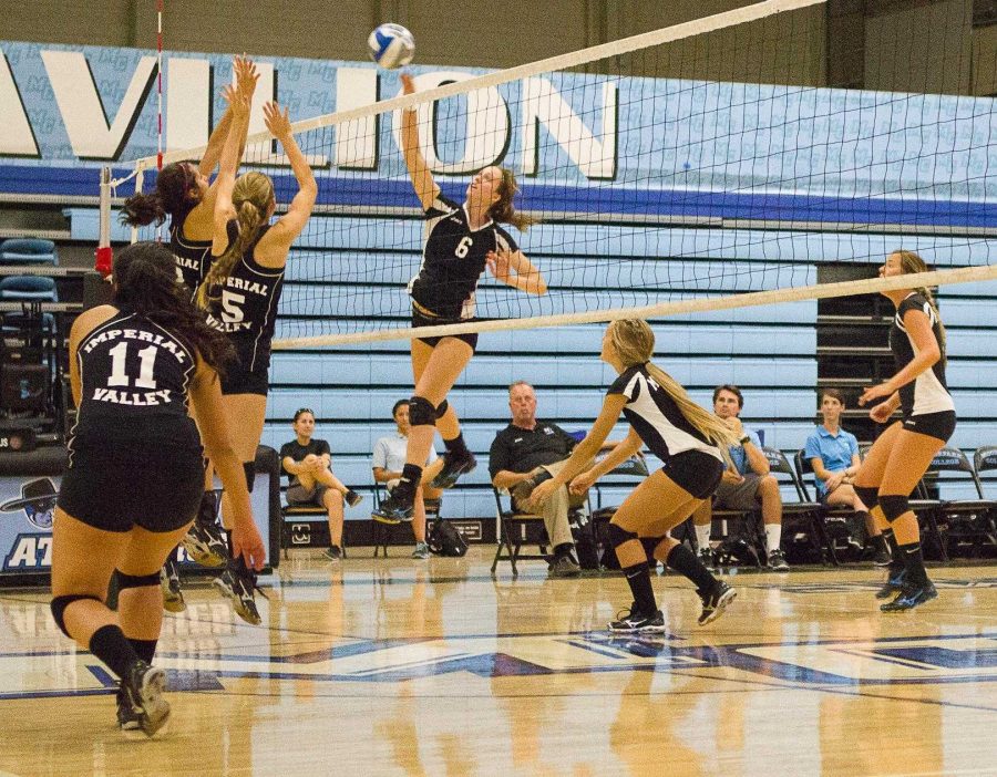Moorpark Raider #6 Brittnie Sharpe, spikes the ball in a match against Imperial Valley College on sept. 21st, 2012. --Photo By Connor Valarde 