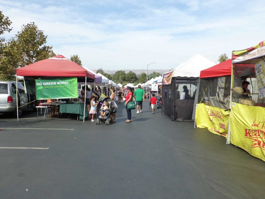 Community members enjoy looking through the organic products at the Moorpark Farmer's Market.