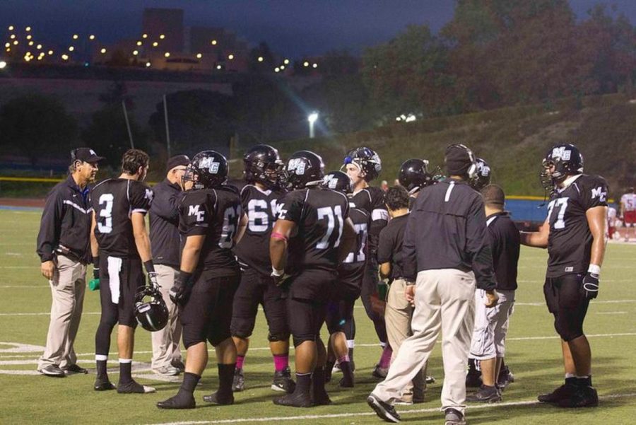 Moorpark Raiders getting a pep talk from their coaches during a game against the Renegades on Oct.20. -Photo by Phillip Sugarman