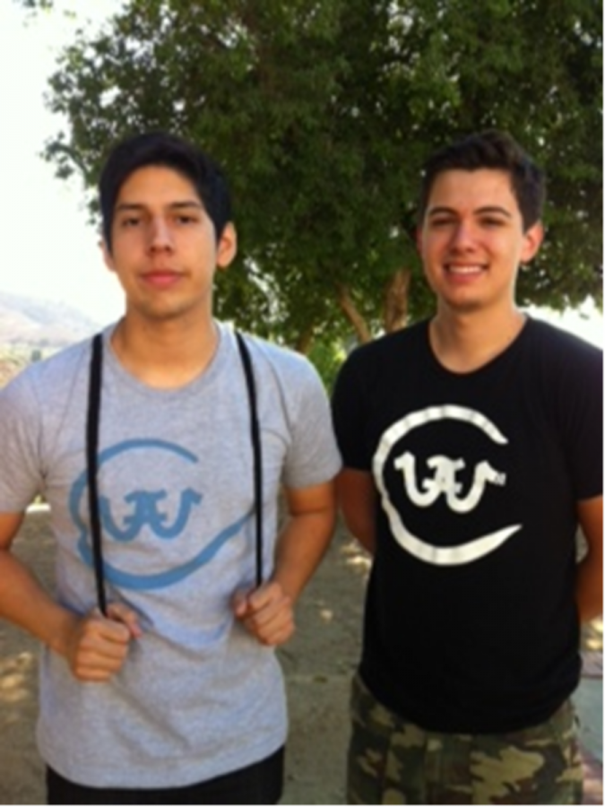 Franco Mego and Scott Langdon pose in their We are the Creation t-shirts. 