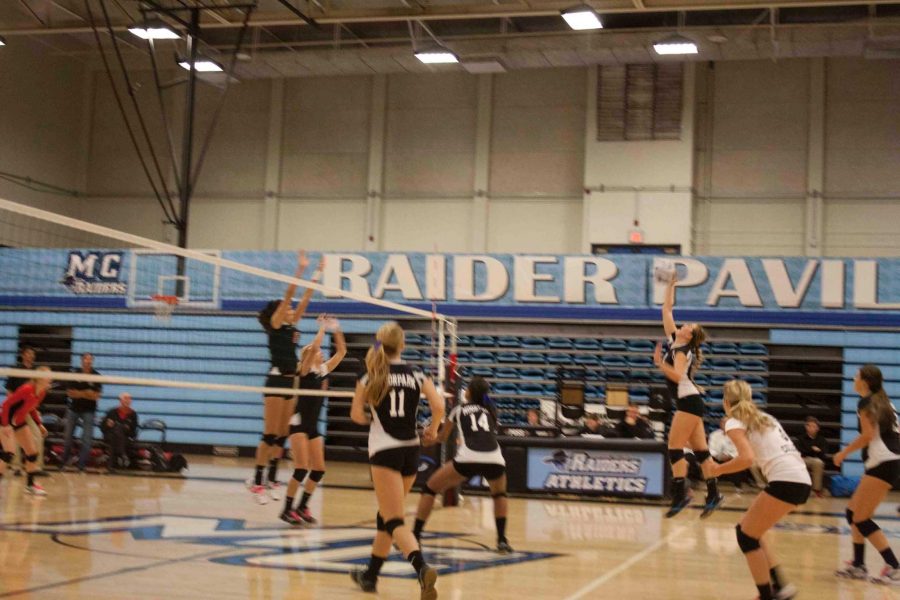 Brittany Sharpe,6, hits the ball over to Santa Barbara City College on Nov. 9.