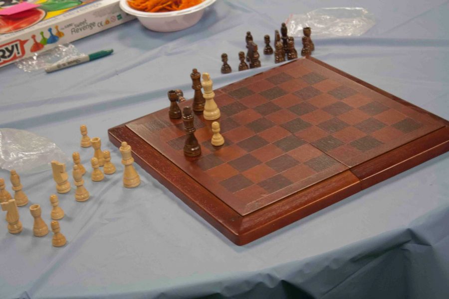 Students had the opportunity to play chess at the Interclub Potluck on March 8.