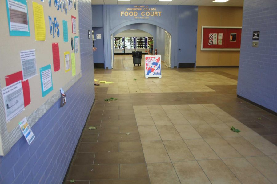 Gusty winds blow students and debris into the cafeteria.