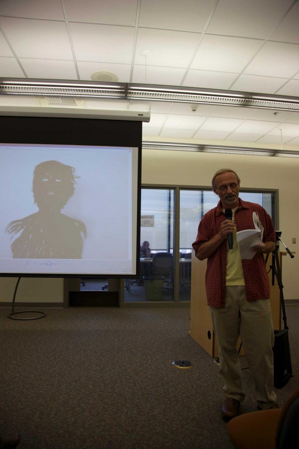 Professor Schulz introduces award-winning alumni of the Moorpark Review to those in attendance.