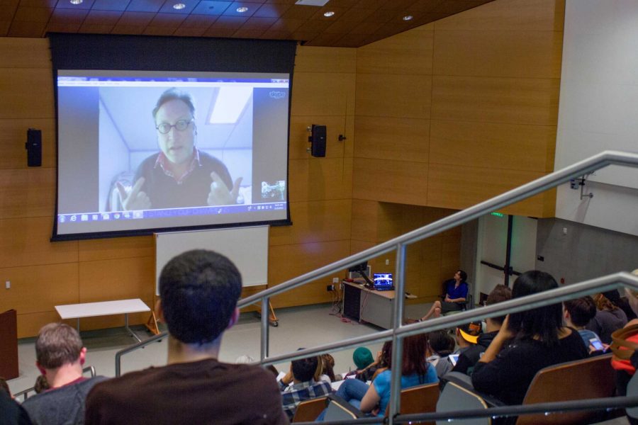 M.T. Anderson addresses students via Skype in EATMs auditorium.