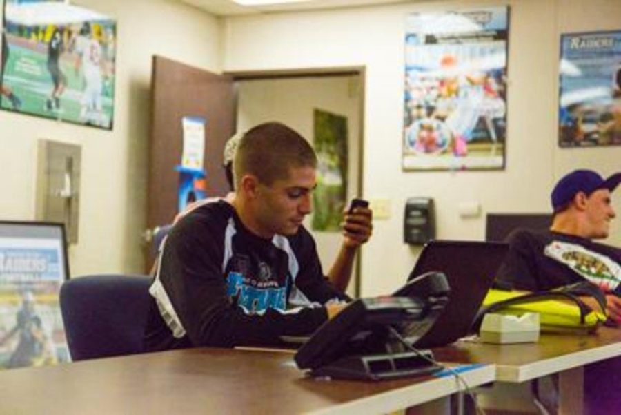 Jeremy Lester, 19, a Kinesiology Major studying in the athletic conference room.