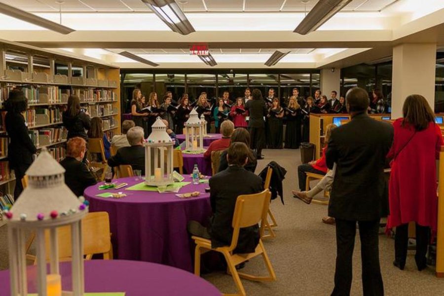 Attendees watch the Moorpark College Choir perform Christmas carols at the Wind and Unwind.