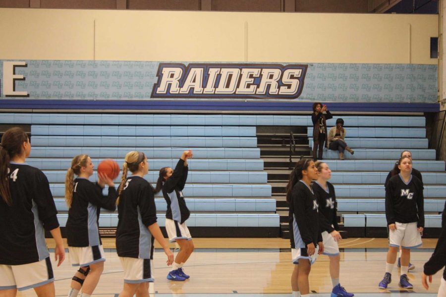 Lady+Raiders+warming+up+before+their+game+against+SBCC.