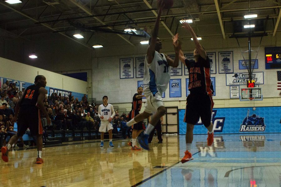 Shaquille Moore goes up for the layup in Remy McCarthys final game, as Moorpark upset Ventura 77-70.