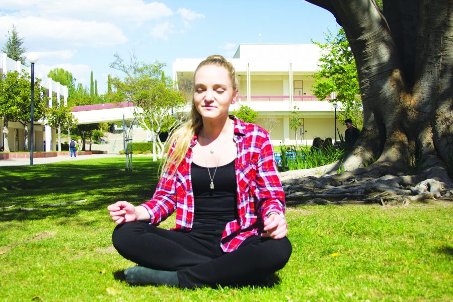 Twenty-year-old Psychology major Madison Grepiotis puts to work the latest meditation techniques that she learned from the Mindful Meditation Group sessions in order to feel stress-free with her hectic schedule and to feel at peace with herself as well.