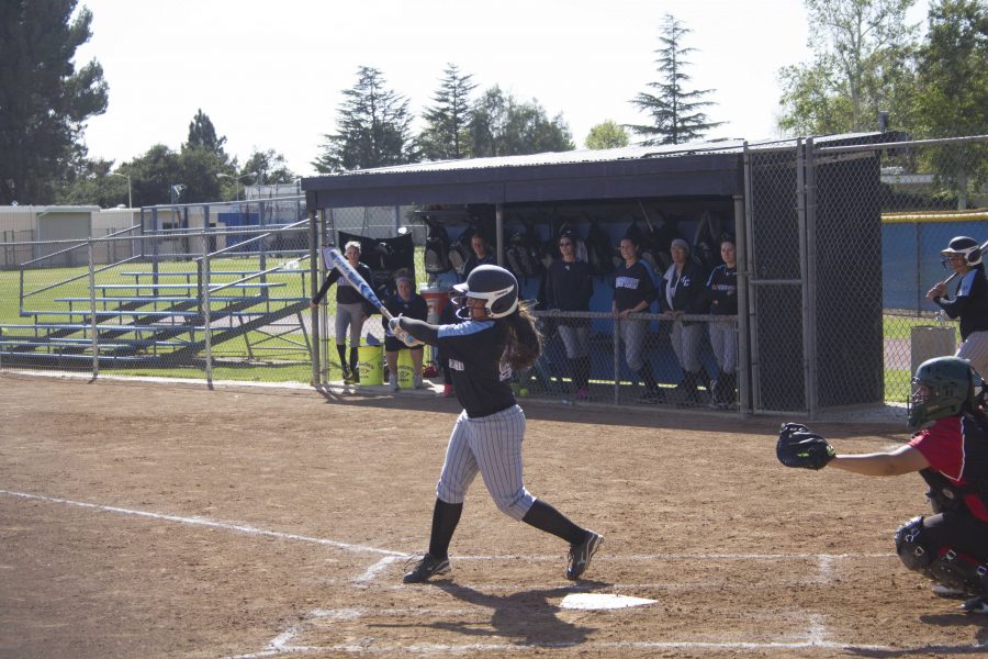 Taylor Vivieros swings and misses in the doubleheader at home. Photo credit: Chase Oliver